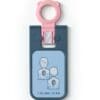 Close up of the pink Philips FRx Infant/Child Key inserted into a HeartStart FRx AED to activate pediatric rescue mode.