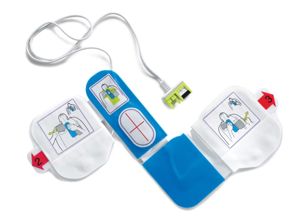 ZOLL CPR-D Padz laid out flat showing the one-piece Z-shape design and central CPR puck.