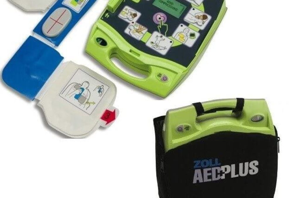 ZOLL AED Plus defibrillator with cover open showing pre-connected ZOLL CPR-D Padz electrode.