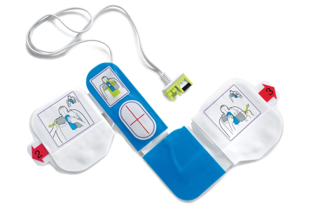 ZOLL CPR-D Padz laid out flat showing the one-piece Z-shape design and central CPR puck.
